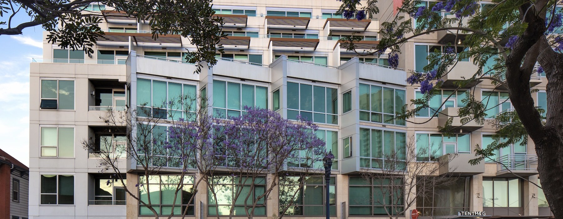 a building with trees in front