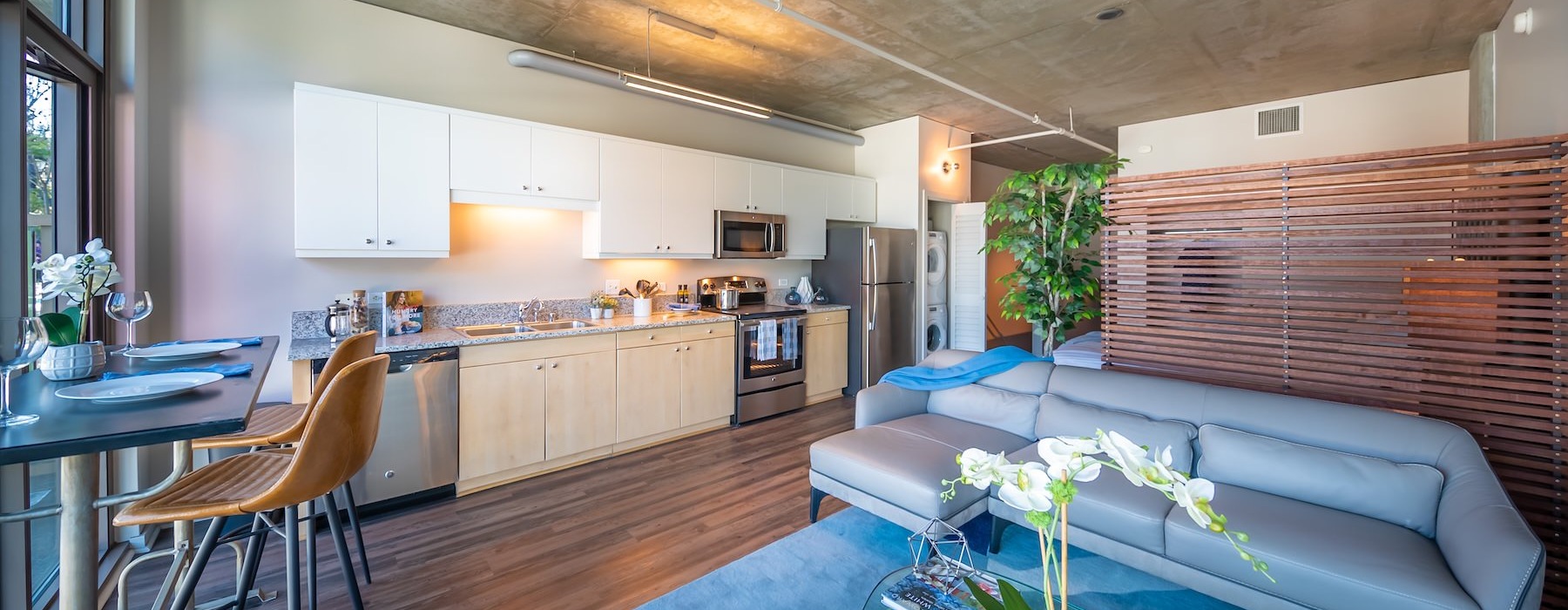 a living room with a couch and a table