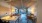 a room with lamps, tables and chairs